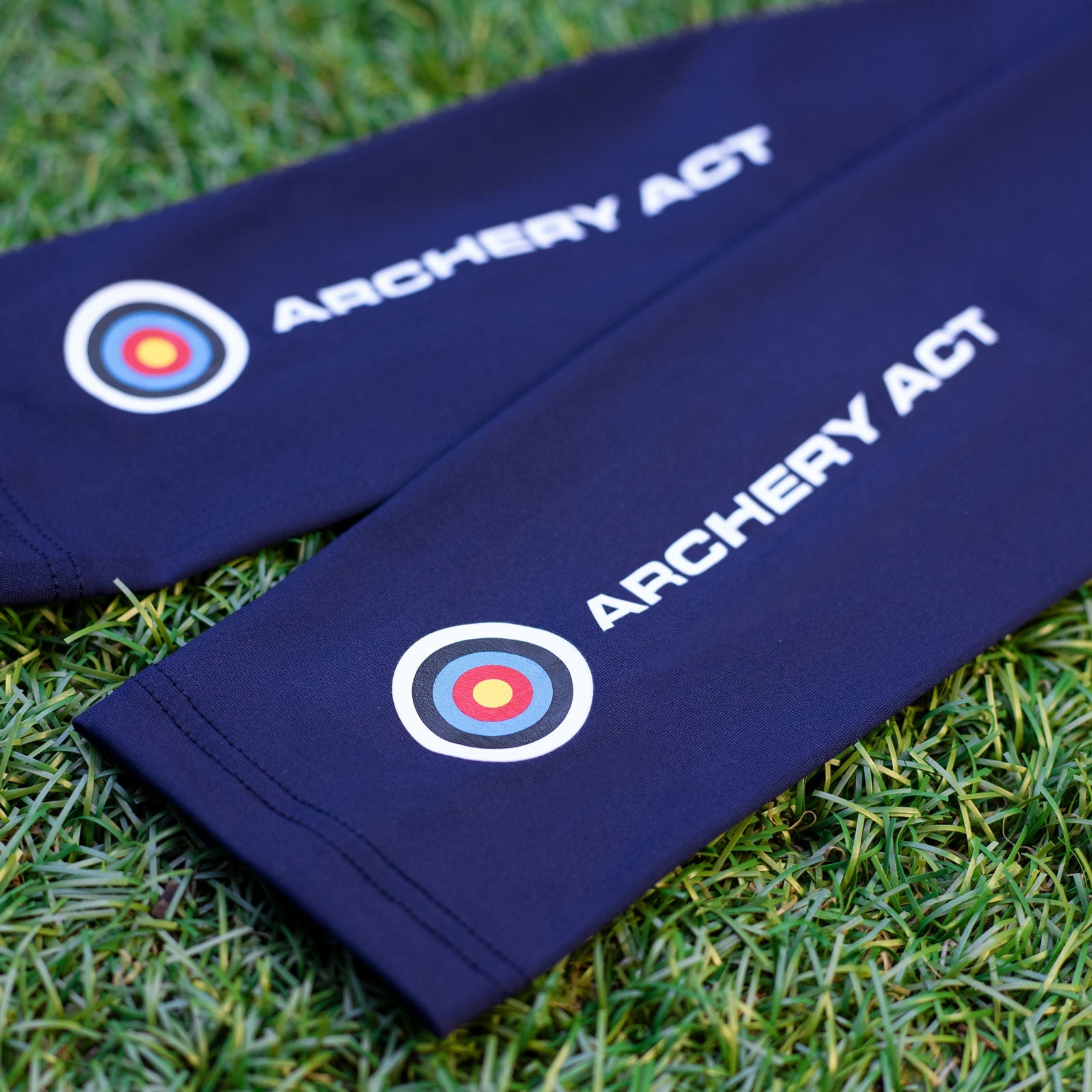 Drak Blue sleeves with archery club logo on
