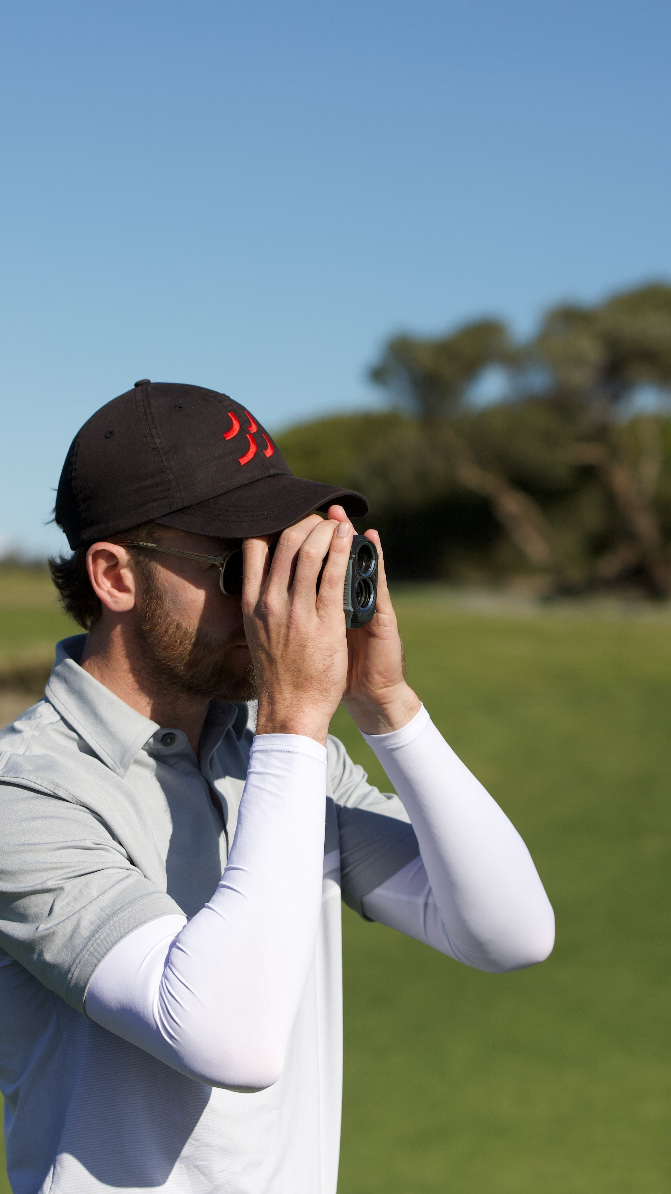 Golf_White_Distance_Finder_00e0b920-63b7-460a-bb55-ac557b8e7724.jpg
